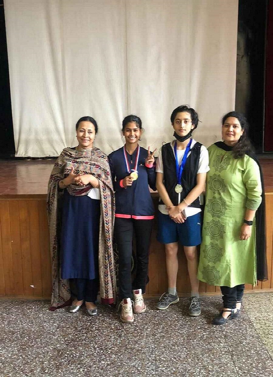 St Bede's skyline behind the lake